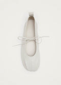 Elva crèmekleurige leren ballerina's